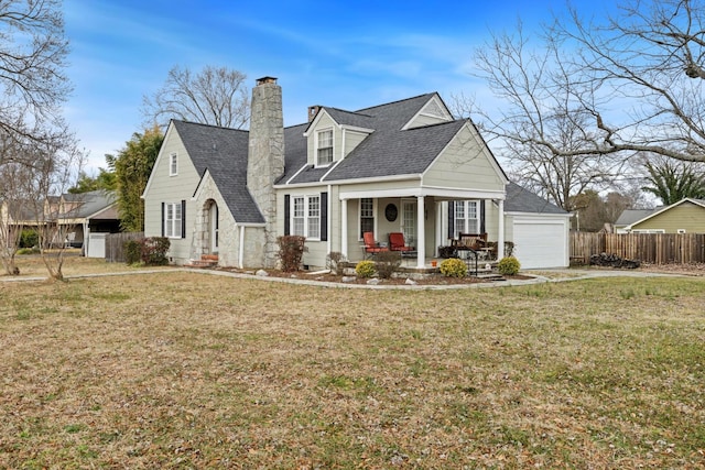 cape cod house featuring a garage, a front yard, and a porch