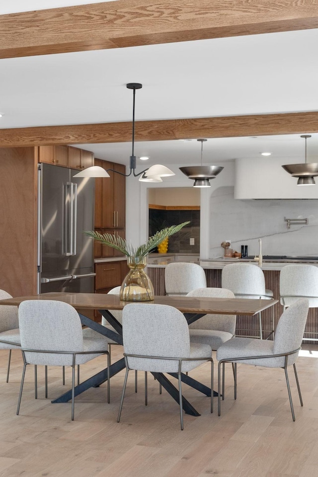 dining room featuring light hardwood / wood-style flooring