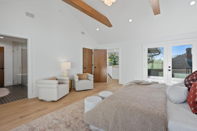 bedroom featuring ensuite bathroom, high vaulted ceiling, access to outside, beam ceiling, and light hardwood / wood-style floors