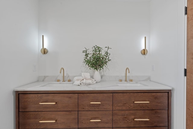 bar with sink and light stone counters