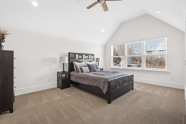 bedroom featuring light carpet, baseboards, a ceiling fan, and lofted ceiling