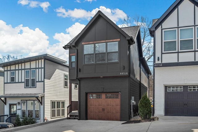 view of front facade with a garage, driveway, and board and batten siding