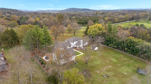 aerial view featuring a view of trees