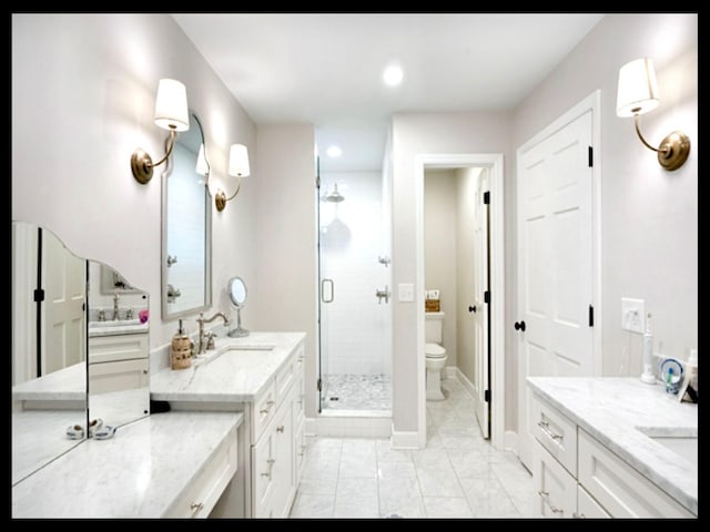 full bathroom featuring toilet, recessed lighting, vanity, baseboards, and a shower stall