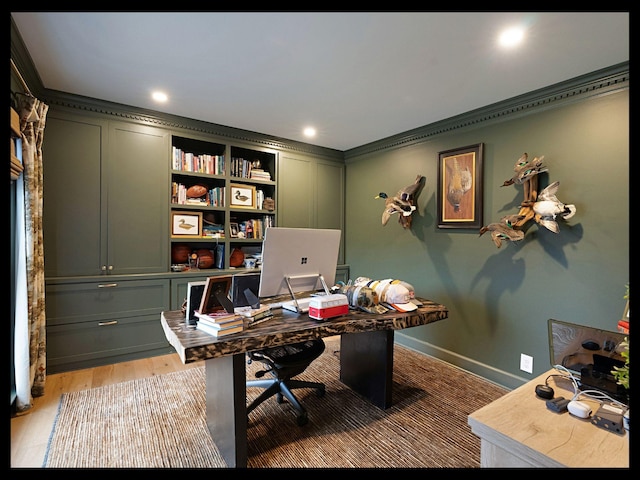 office featuring light wood-type flooring, baseboards, ornamental molding, and recessed lighting