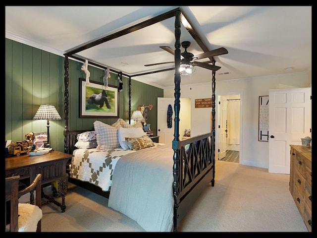 bedroom with ornamental molding, carpet flooring, and ceiling fan