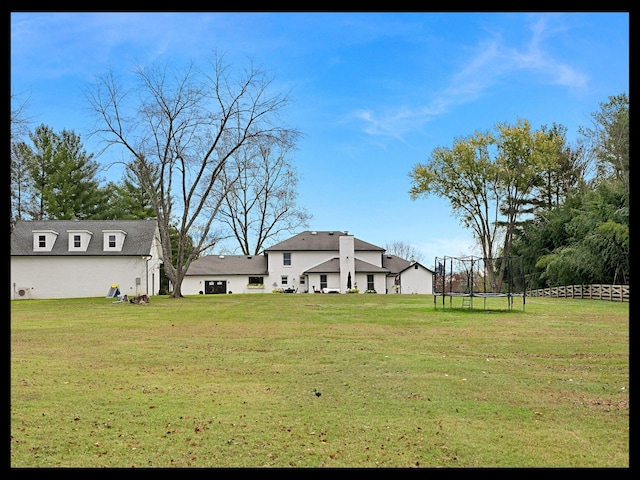 view of yard featuring a trampoline