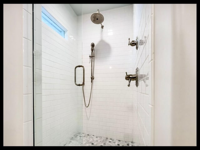 bathroom with a stall shower