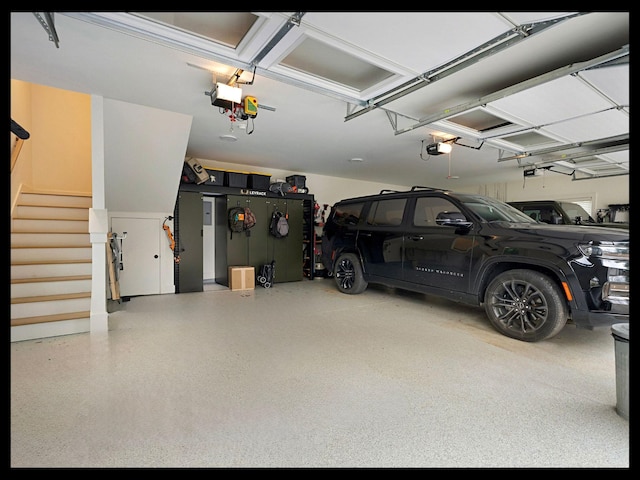 garage featuring a garage door opener