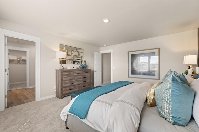 bedroom with light colored carpet