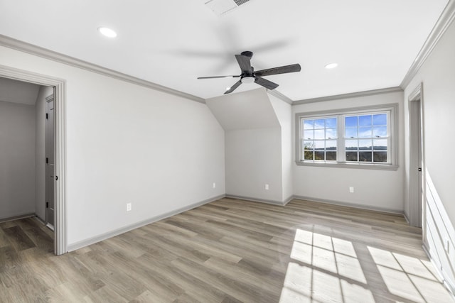 bonus room with ceiling fan and light wood-type flooring