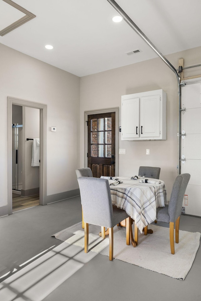 dining room featuring concrete floors