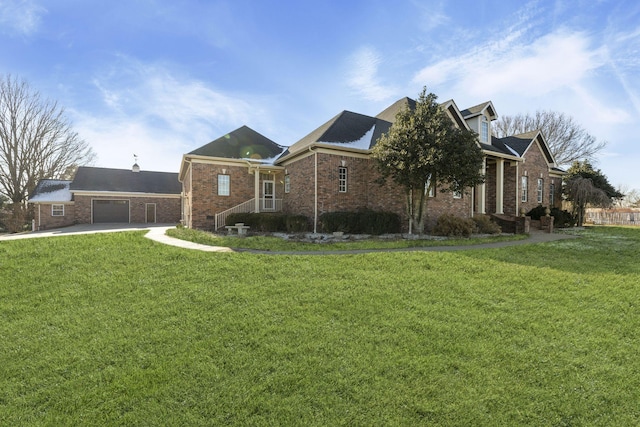 exterior space with a garage and a yard