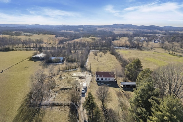 aerial view featuring a mountain view and a rural view