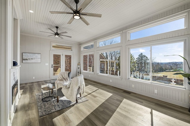 sunroom featuring wooden ceiling