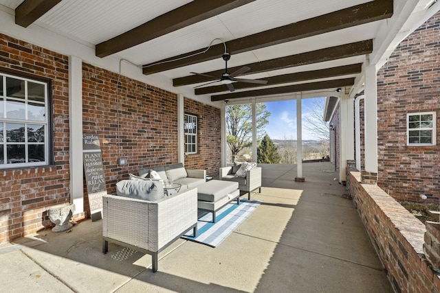 view of patio / terrace with ceiling fan and outdoor lounge area