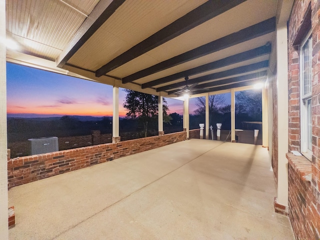 view of patio terrace at dusk