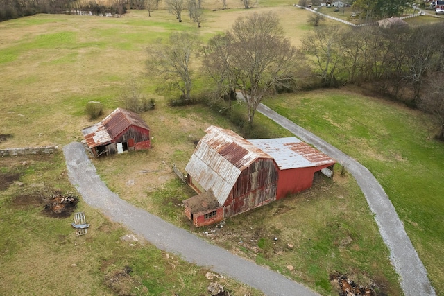 birds eye view of property featuring a rural view