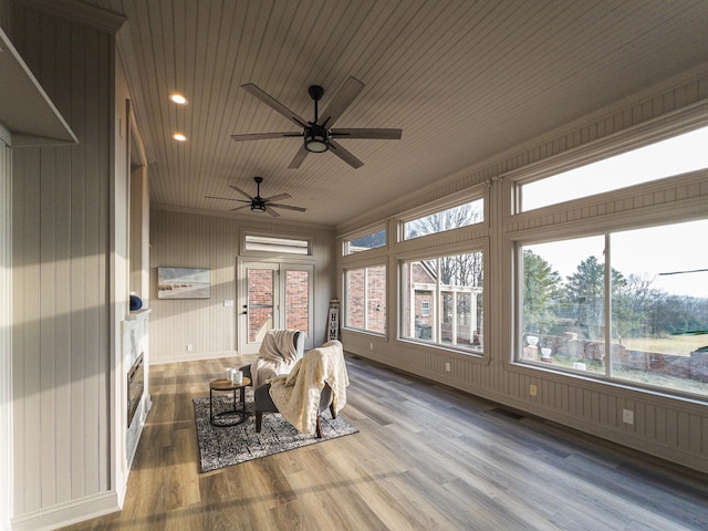 unfurnished sunroom featuring wood ceiling