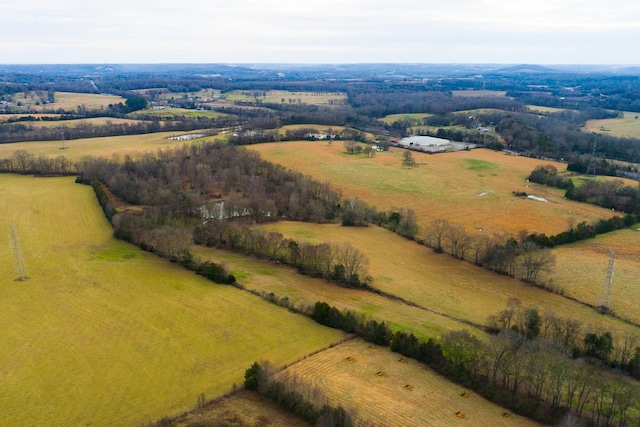 birds eye view of property featuring a rural view