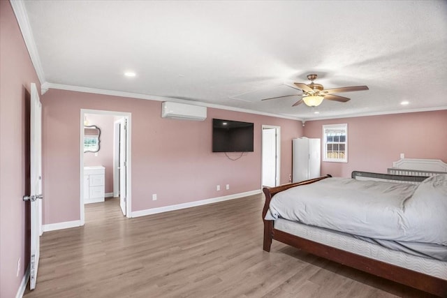 bedroom featuring ceiling fan, ornamental molding, a wall mounted AC, and hardwood / wood-style floors