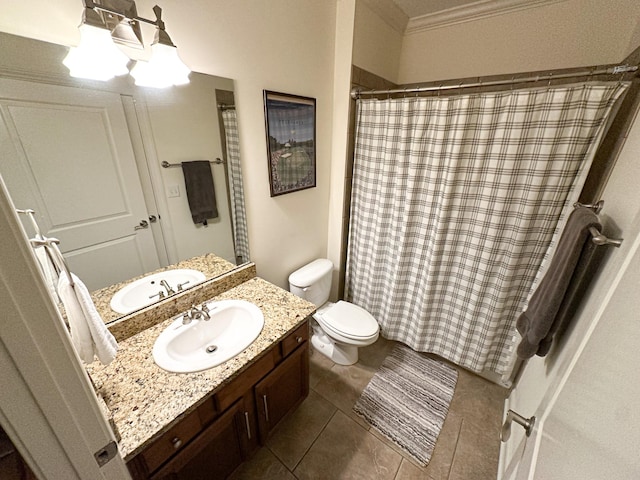 bathroom with tile patterned floors, toilet, a shower with curtain, vanity, and ornamental molding