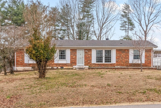 ranch-style house with a front lawn