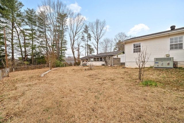 view of yard with central AC unit