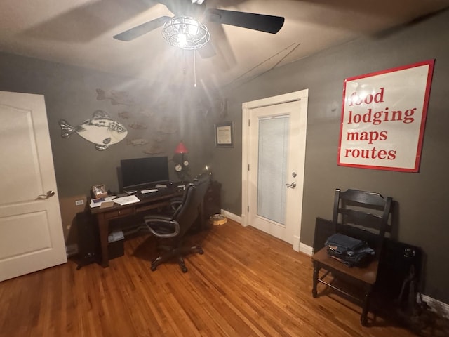 office with ceiling fan and hardwood / wood-style floors