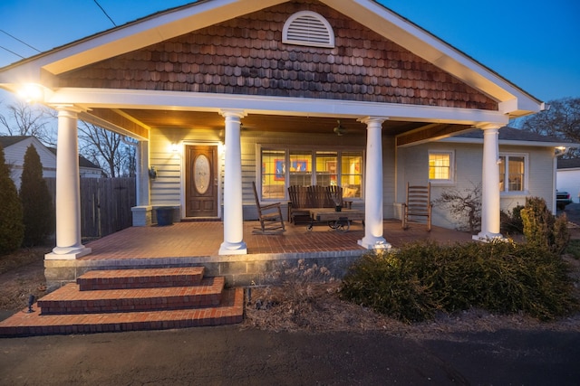 back of house with a porch