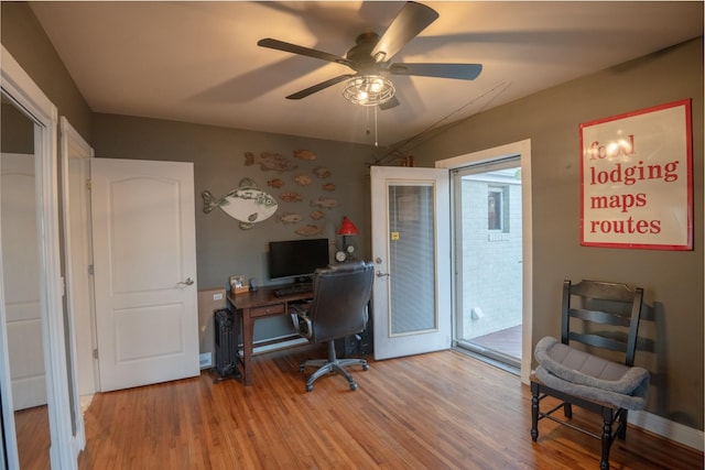 office with ceiling fan and wood finished floors