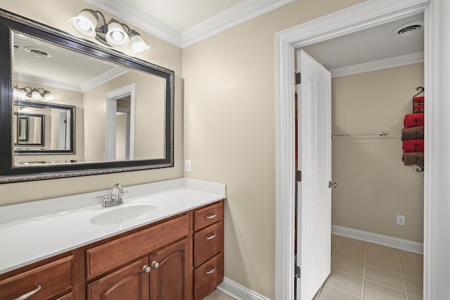 bathroom featuring tile patterned floors, ornamental molding, and vanity