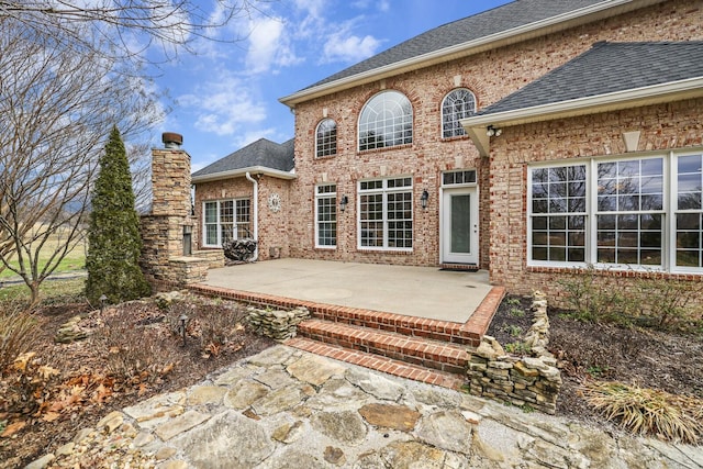 rear view of property with a patio area