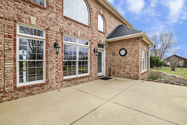 property entrance with a patio