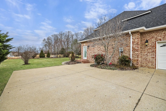 view of patio / terrace featuring a garage