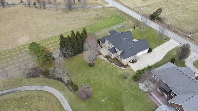 birds eye view of property featuring a rural view