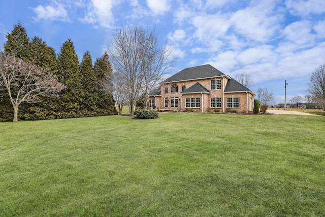 view of front facade with a front yard