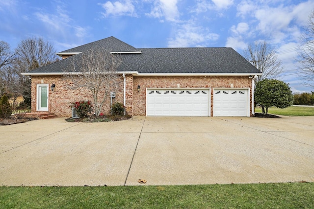 view of side of property featuring a garage