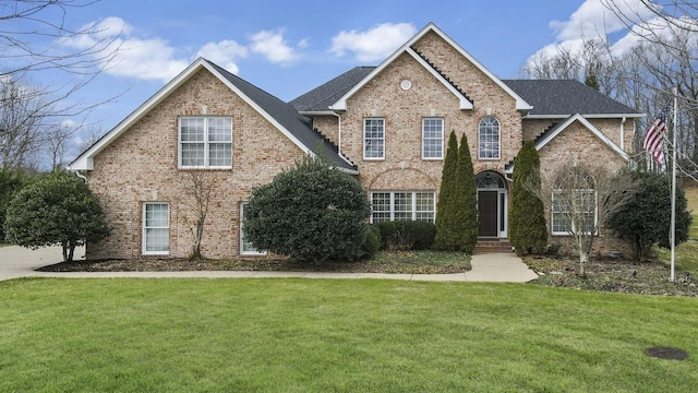 view of property featuring a front yard