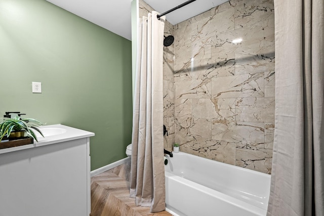 full bathroom featuring vanity, parquet flooring, toilet, and shower / bath combo with shower curtain