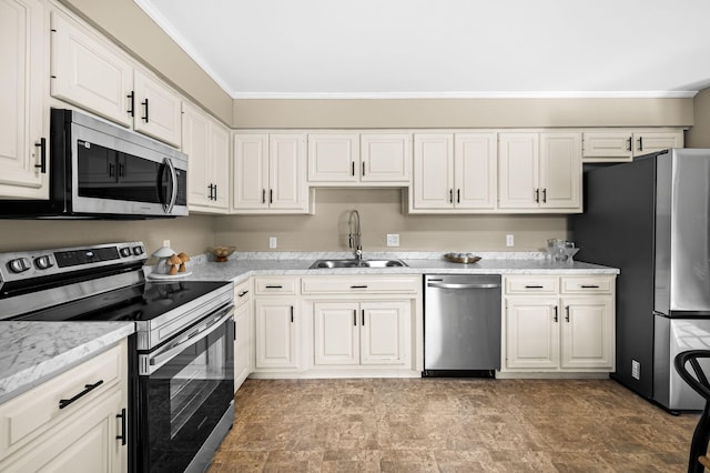 kitchen featuring stainless steel appliances, sink, and white cabinets