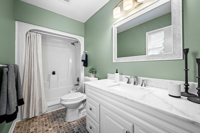 full bathroom featuring vanity, shower / tub combo with curtain, tile patterned floors, and toilet