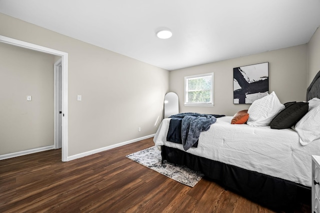 bedroom featuring dark hardwood / wood-style floors