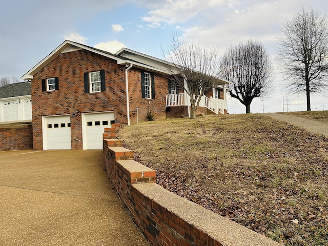 view of property exterior with a garage