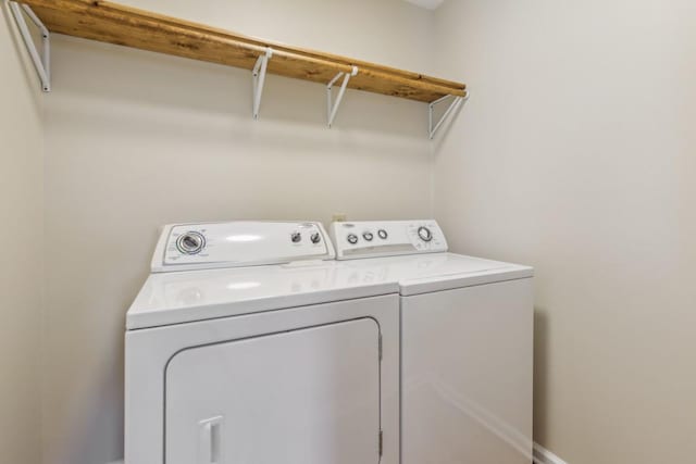 laundry area featuring washing machine and dryer