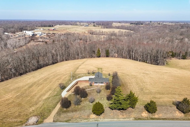 birds eye view of property featuring a rural view