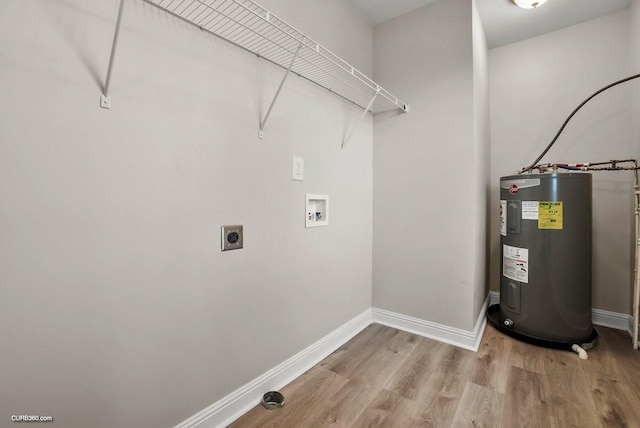 washroom with light hardwood / wood-style flooring, hookup for a washing machine, water heater, and electric dryer hookup