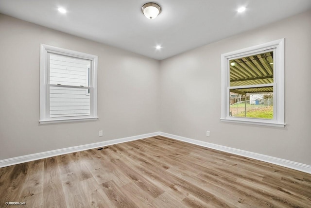 empty room featuring light hardwood / wood-style floors