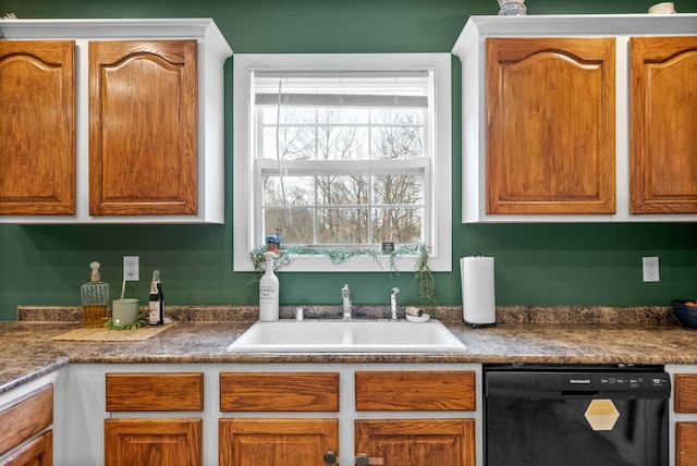 kitchen featuring dishwasher and sink