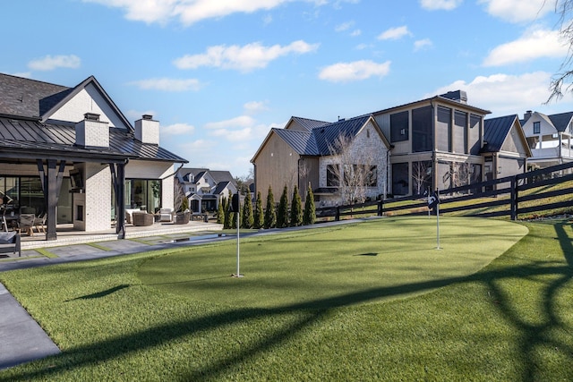 view of property's community with a patio